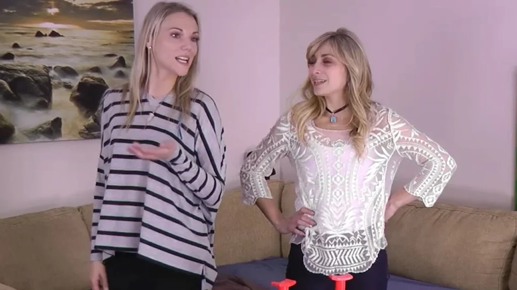 Whipped cream flies as they both play a Strip Facial Frenzy game